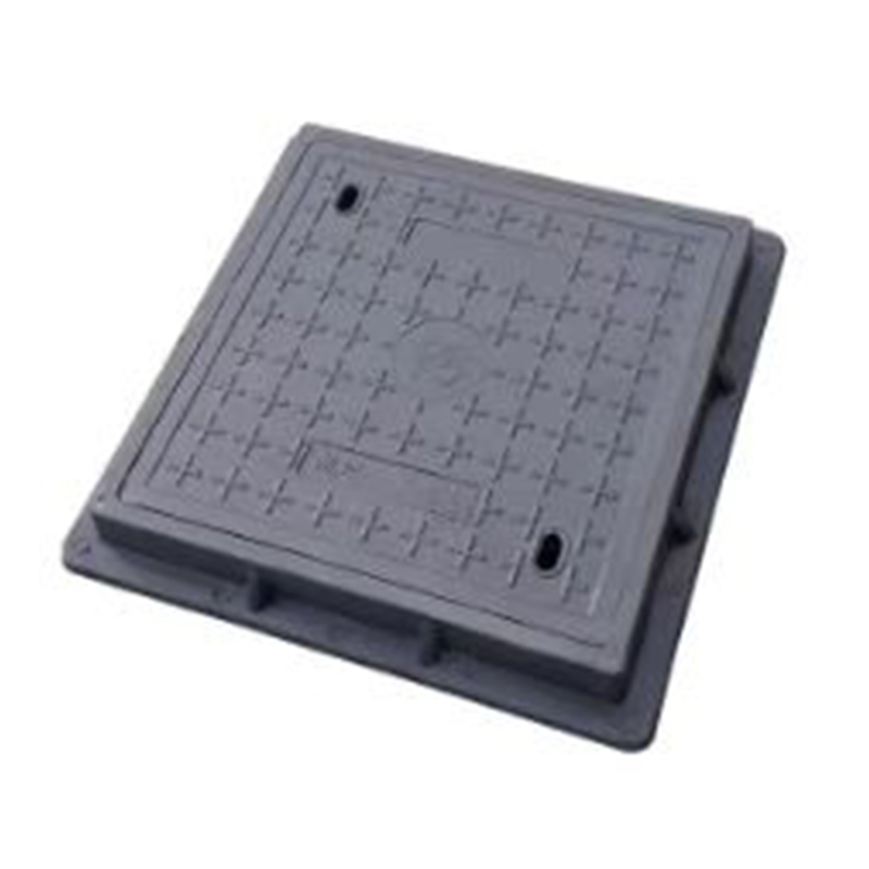 Como uma tampa de bueiro de resina lida com o assentamento do solo em comparação com uma tampa de bueiro de ferro fundido?